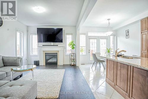 69 Thornbush Boulevard, Brampton, ON - Indoor Photo Showing Living Room With Fireplace