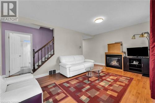 18 Eaton Place, Hamilton, ON - Indoor Photo Showing Living Room With Fireplace