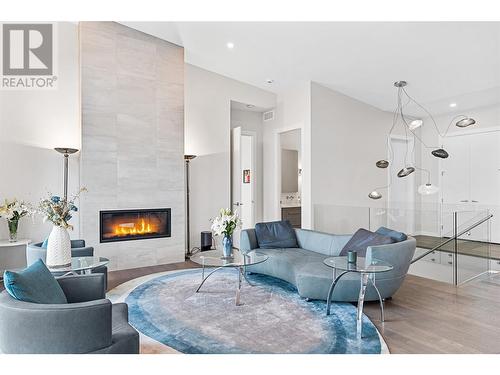 419 Shorts Road, Fintry, BC - Indoor Photo Showing Living Room With Fireplace