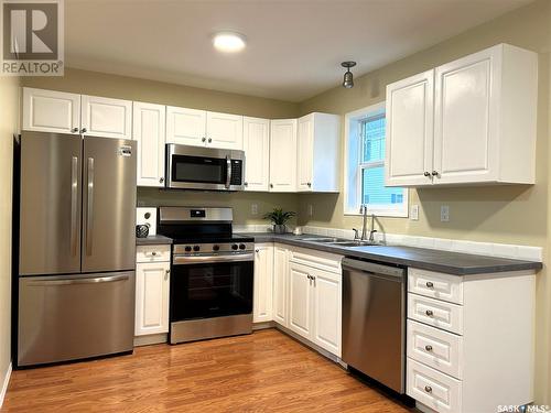 64 203 Herold Terrace, Saskatoon, SK - Indoor Photo Showing Kitchen With Double Sink