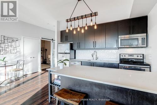 312 - 5101 Dundas Street W, Toronto (Islington-City Centre West), ON - Indoor Photo Showing Kitchen