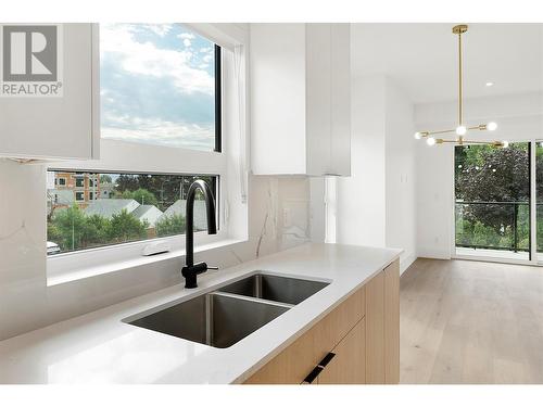 640 Wardlaw Street Unit# 304, Kelowna, BC - Indoor Photo Showing Kitchen With Double Sink