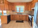 211 Maple Street, Outlook, SK  - Indoor Photo Showing Kitchen With Double Sink 