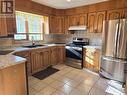 211 Maple Street, Outlook, SK  - Indoor Photo Showing Kitchen With Double Sink 