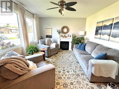 211 20Th Street, Battleford, SK - Indoor Photo Showing Living Room With Fireplace