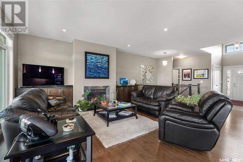 243 Fleming Crescent, Saskatoon, SK - Indoor Photo Showing Living Room With Fireplace