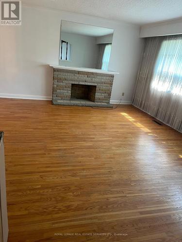 Main - 214 Dixon Road, Toronto (Kingsview Village-The Westway), ON - Indoor Photo Showing Other Room With Fireplace