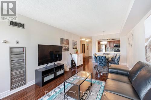 401 - 1 Hickory Tree Road, Toronto, ON - Indoor Photo Showing Living Room