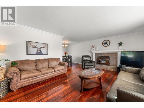 781 Carmi Avenue, Penticton, BC - Indoor Photo Showing Living Room With Fireplace