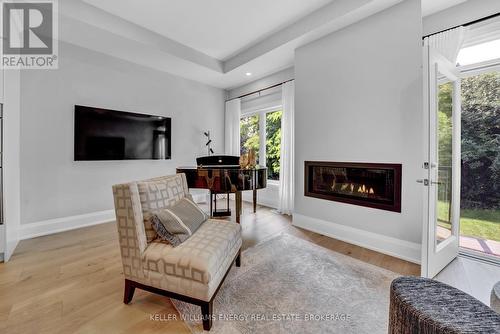 7 Twelve Trees Court, Prince Edward County (Wellington), ON - Indoor Photo Showing Living Room With Fireplace