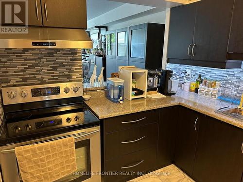 222 - 75 Bamburgh Circle, Toronto (Steeles), ON - Indoor Photo Showing Kitchen