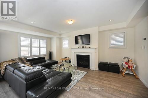 306 Gillett Point N, Milton (Ford), ON - Indoor Photo Showing Living Room With Fireplace