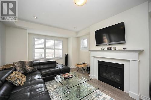 306 Gillett Point N, Milton (Ford), ON - Indoor Photo Showing Living Room With Fireplace