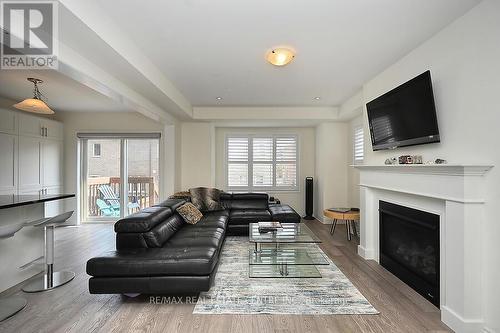 306 Gillett Point N, Milton (Ford), ON - Indoor Photo Showing Living Room With Fireplace