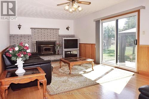 93 Old Chicopee Drive, Kitchener, ON - Indoor Photo Showing Living Room With Fireplace