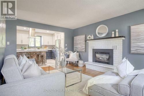 50 Bechtel Street, Cambridge, ON - Indoor Photo Showing Living Room With Fireplace