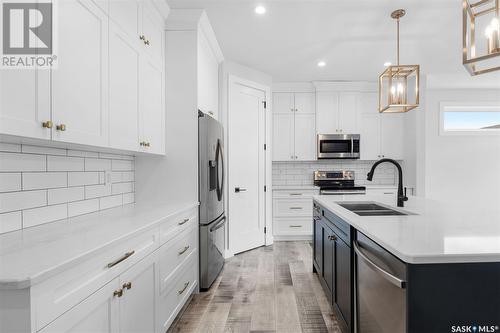 206 Germain Court, Saskatoon, SK - Indoor Photo Showing Kitchen With Double Sink With Upgraded Kitchen