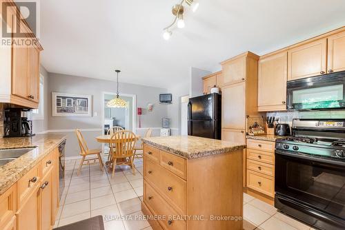 239 Chittick Crescent, Thames Centre (Dorchester), ON - Indoor Photo Showing Kitchen With Double Sink