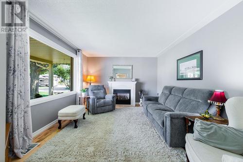 239 Chittick Crescent, Thames Centre (Dorchester), ON - Indoor Photo Showing Living Room With Fireplace