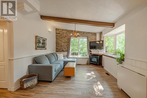 23 Pops Lane, Wasaga Beach, ON - Indoor Photo Showing Living Room With Fireplace