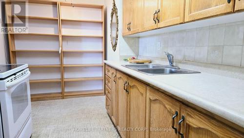 315 - 2825 Islington Avenue, Toronto (Humber Summit), ON - Indoor Photo Showing Kitchen With Double Sink