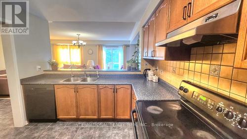 3974 Stardust Drive, Mississauga (Churchill Meadows), ON - Indoor Photo Showing Kitchen With Double Sink