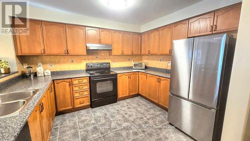 3974 Stardust Drive, Mississauga, ON - Indoor Photo Showing Kitchen With Double Sink