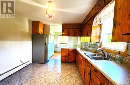 119 Route 100, Nauwigewauk, NB - Indoor Photo Showing Kitchen With Double Sink