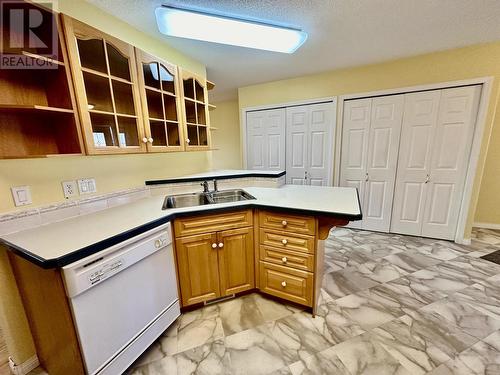 9918 115 Avenue, Fort St. John, BC - Indoor Photo Showing Kitchen With Double Sink