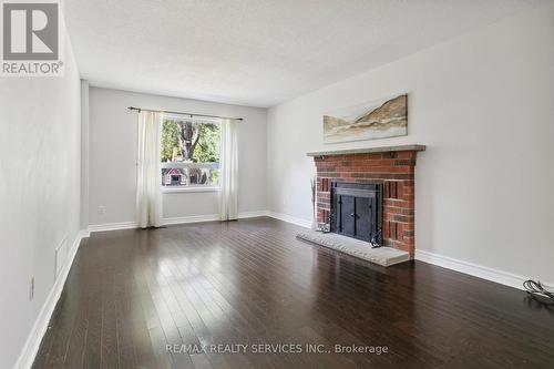 52 Nipissing Crescent, Brampton (Westgate), ON - Indoor Photo Showing Living Room With Fireplace