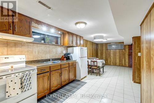 16 Heavitree Drive, Toronto, ON - Indoor Photo Showing Kitchen With Double Sink