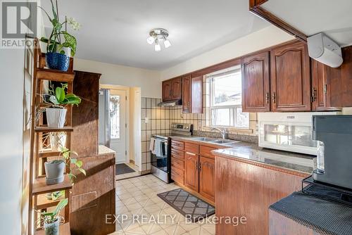 16 Heavitree Drive S, Toronto, ON - Indoor Photo Showing Kitchen With Double Sink