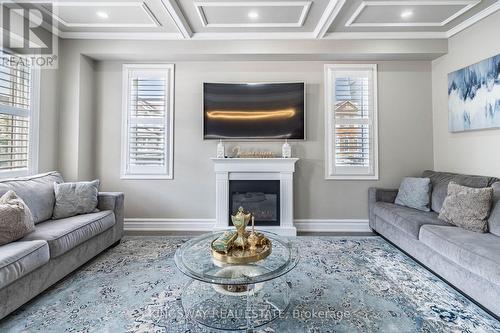 166 Bronson Terrace, Milton (Ford), ON - Indoor Photo Showing Living Room With Fireplace