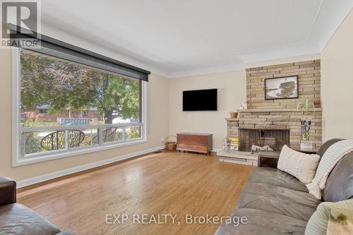 111 Oneida Boulevard, Hamilton (Ancaster), ON - Indoor Photo Showing Living Room With Fireplace