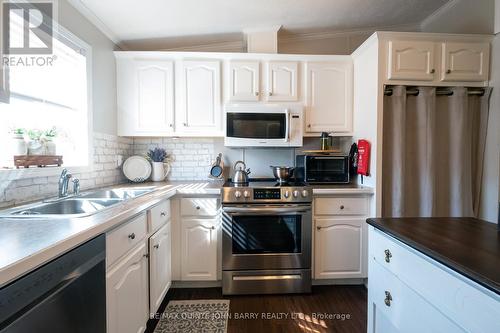 153 County Road 27 #A4, Prince Edward County (Ameliasburgh), ON - Indoor Photo Showing Kitchen With Double Sink