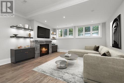 8 Vesta Drive, Toronto, ON - Indoor Photo Showing Living Room With Fireplace