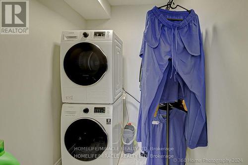 1404 - 100 Wingarden Court, Toronto, ON - Indoor Photo Showing Laundry Room