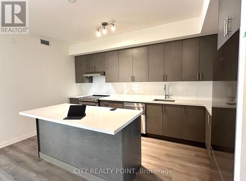 323 - 8960 Jane Street, Vaughan, ON - Indoor Photo Showing Kitchen With Upgraded Kitchen