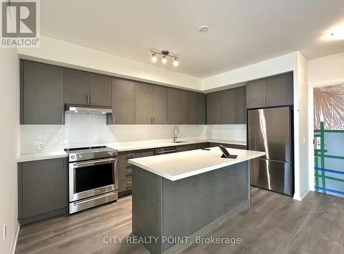 323 - 8960 Jane Street, Vaughan, ON - Indoor Photo Showing Kitchen With Stainless Steel Kitchen With Upgraded Kitchen