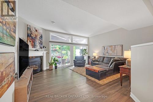 8 - 177 Main Street W, Grimsby, ON - Indoor Photo Showing Living Room With Fireplace