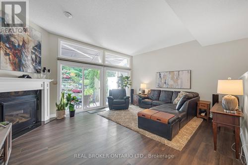 8 - 177 Main Street W, Grimsby, ON - Indoor Photo Showing Living Room With Fireplace