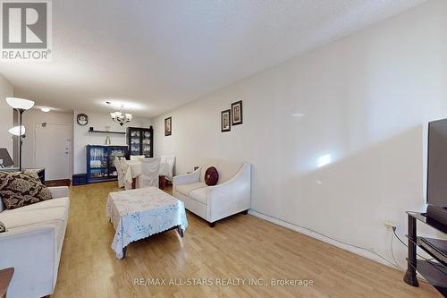 605 - 1275 Markham Road, Toronto (Woburn), ON - Indoor Photo Showing Living Room With Fireplace