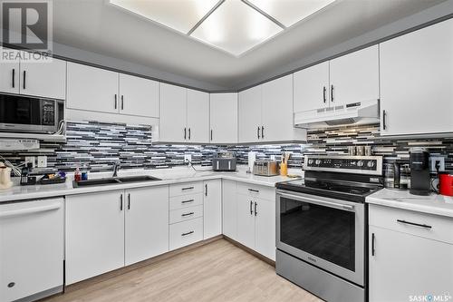 202 2405 1St Avenue W, Prince Albert, SK - Indoor Photo Showing Kitchen With Double Sink