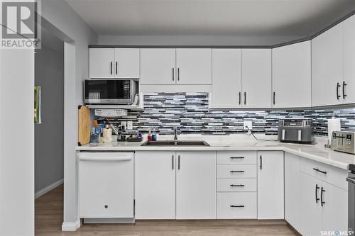 202 2405 1St Avenue W, Prince Albert, SK - Indoor Photo Showing Kitchen With Double Sink