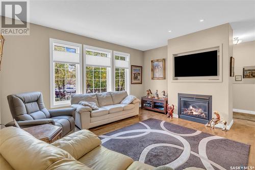 1637 Canterbury Lane, Regina, SK - Indoor Photo Showing Living Room With Fireplace