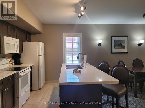 2054-55 - 90 Highland Drive, Oro-Medonte (Horseshoe Valley), ON - Indoor Photo Showing Kitchen With Double Sink