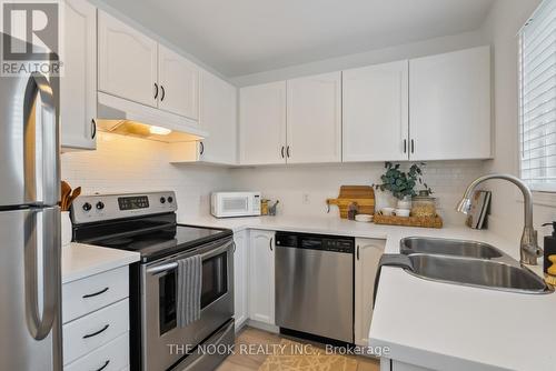 14 Barron Court, Clarington (Courtice), ON - Indoor Photo Showing Kitchen With Double Sink