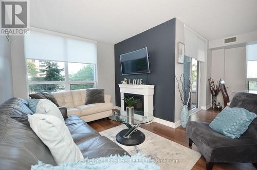 248 - 25 Viking Lane, Toronto (Islington-City Centre West), ON - Indoor Photo Showing Living Room With Fireplace