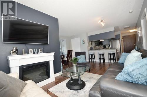 248 - 25 Viking Lane, Toronto (Islington-City Centre West), ON - Indoor Photo Showing Living Room With Fireplace