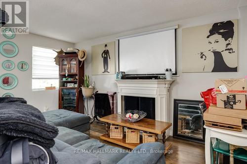 12 Snider Avenue, Toronto (Briar Hill-Belgravia), ON - Indoor Photo Showing Living Room With Fireplace